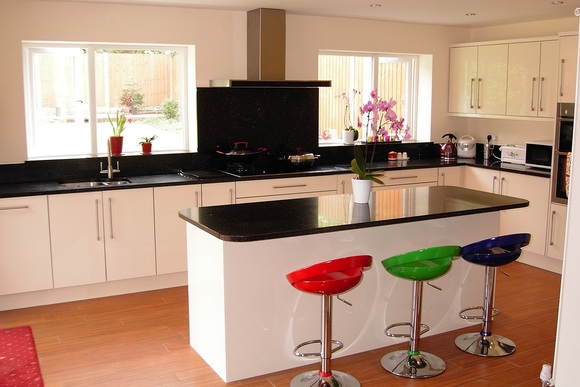 White Zurfiz Acrylic with Mauna Black Quartz Bespoke Fitted Kitchen