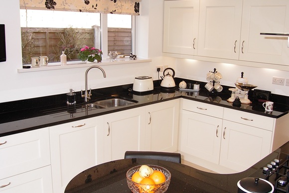 Ivory Belfell with Curved Black Star Granite Bespoke Fitted Kitchen
