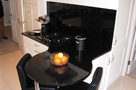 Ivory Belfell with Curved Black Star Granite Bespoke Fitted Kitchen
