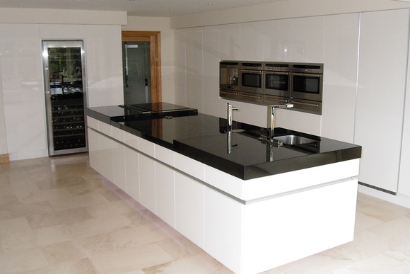 White Ultra High Gloss Acrylic with Black Granite Bespoke Fitted Kitchen