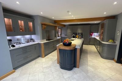 Framed Marlow fitted kitchen in Dust Gey Overmantle.