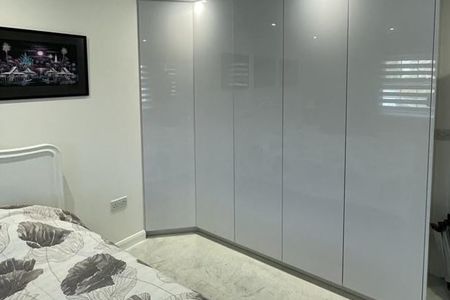 Fitted light grey wardrobes