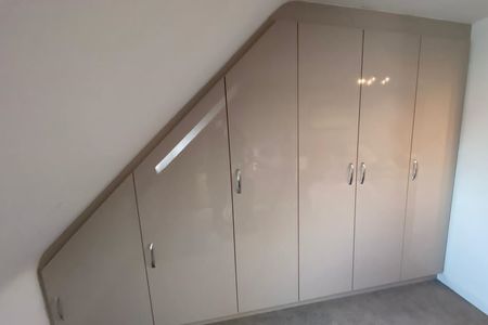 Fitted wardrobes in High Gloss Cashmere